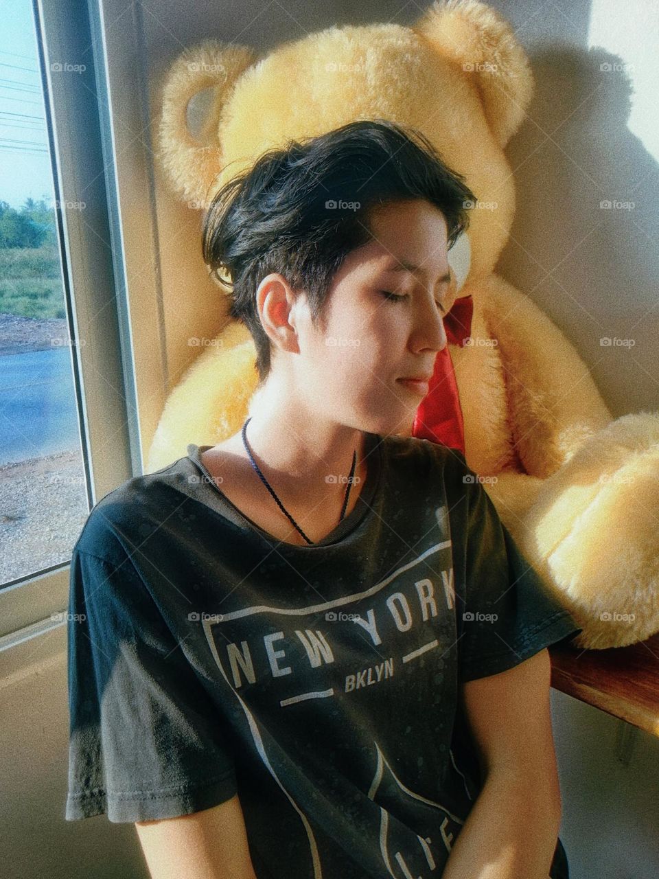 My boyfriend is relaxing in a cafe.