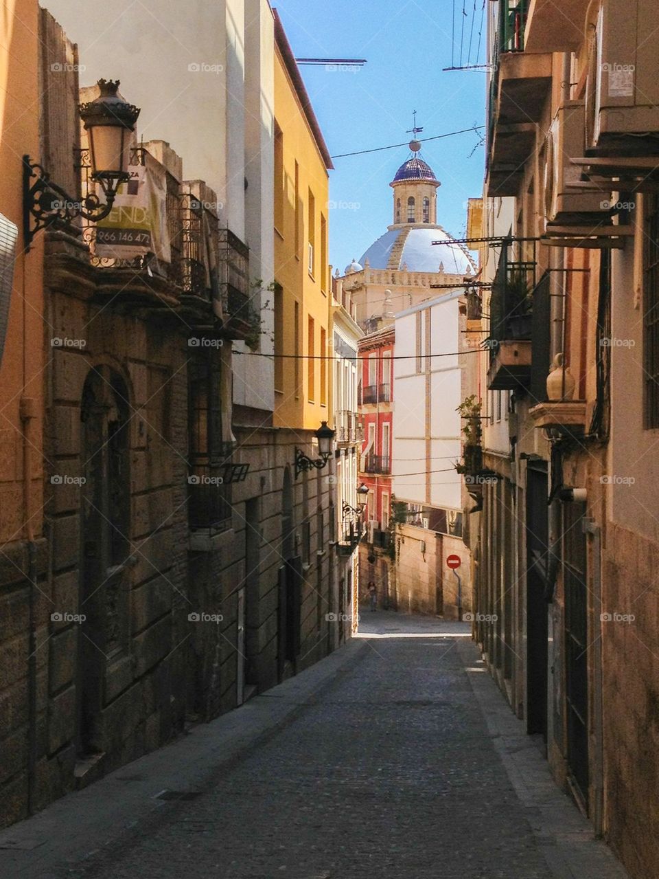 Alley of old town in Alicante, Spain