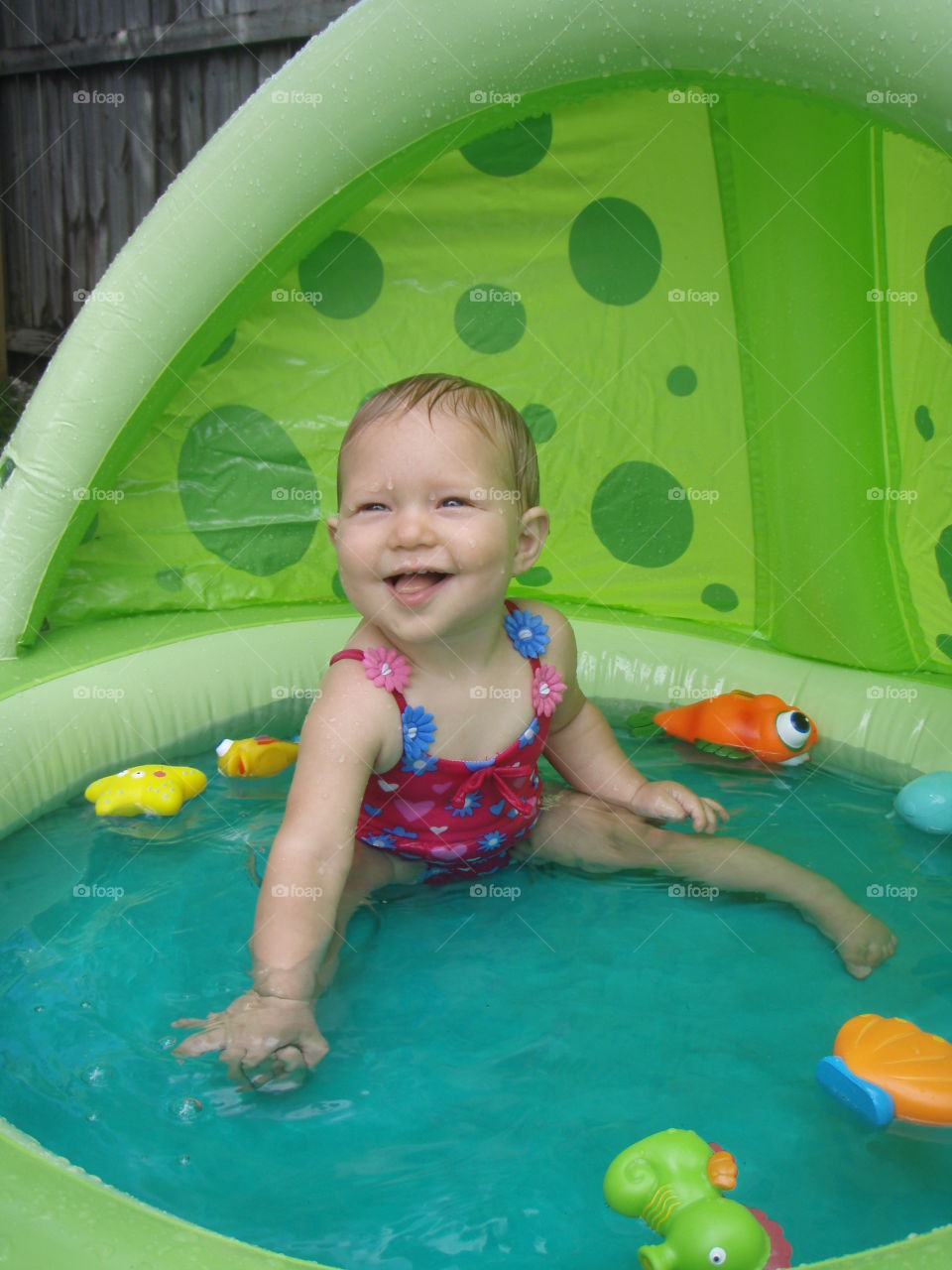 Baby's first time in a pool!