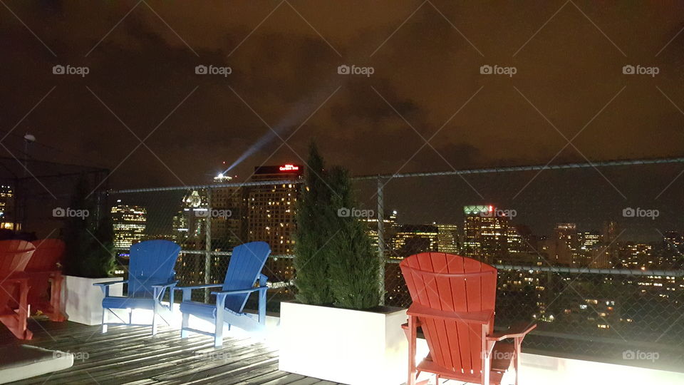 Downtown Montreal at night from rooftop patio