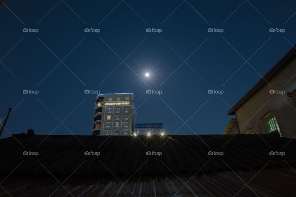 Looking at the full moon from my apartment 