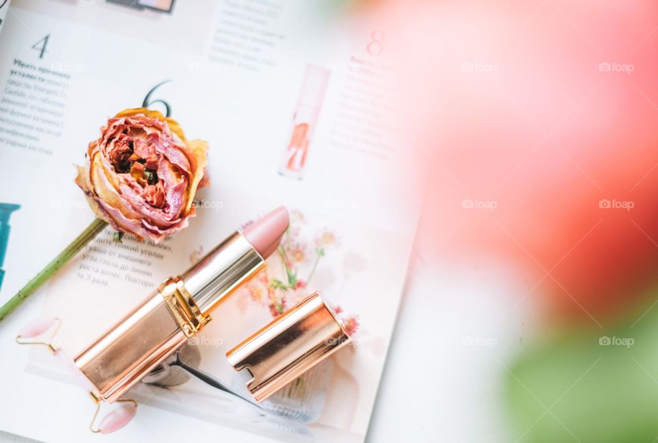 Makeup products on window sill