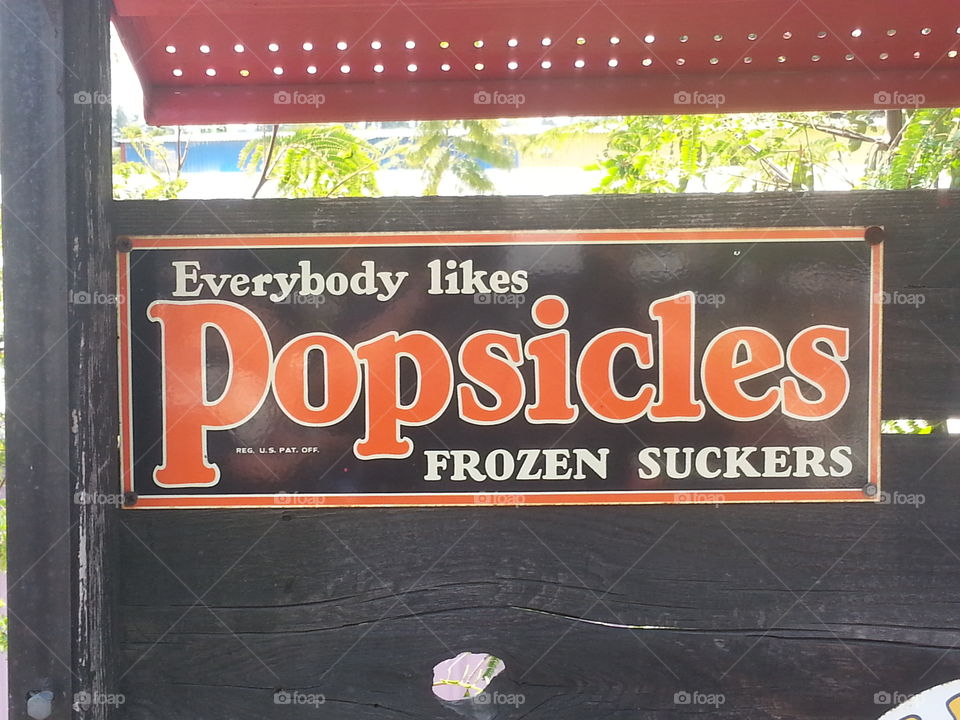 Everyone likes Popsicles logo sign