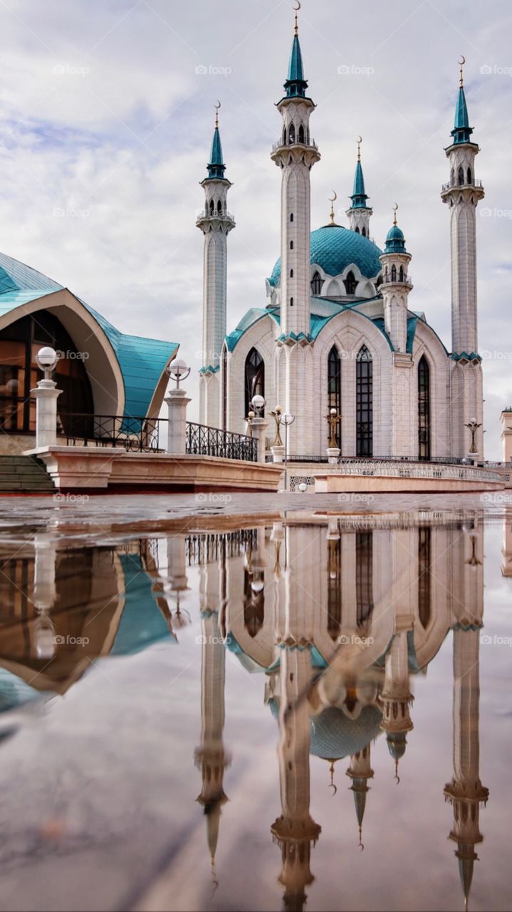 Mosque with reflection after rain