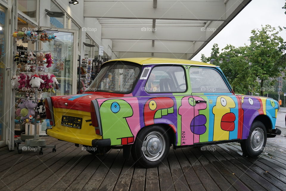 Colourful clash of colours ❤️🧡💛💚💙on a car 💜