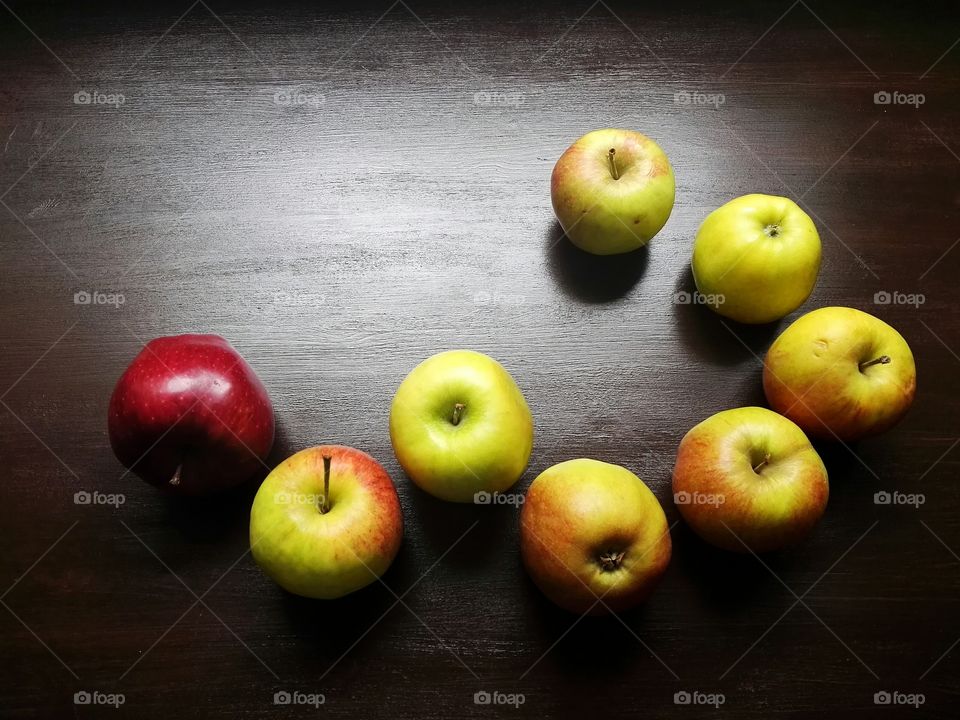 High angle view apples on wood