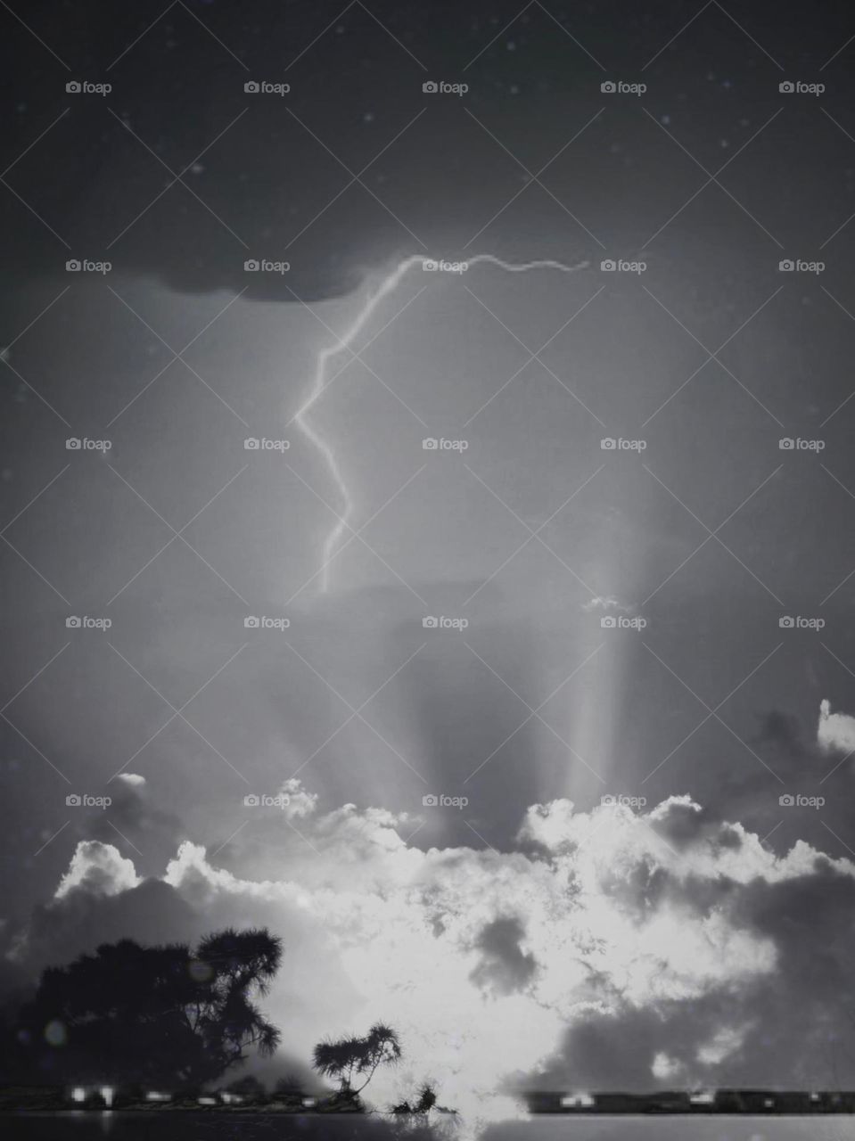 Summertime Florida lightning at sunset.