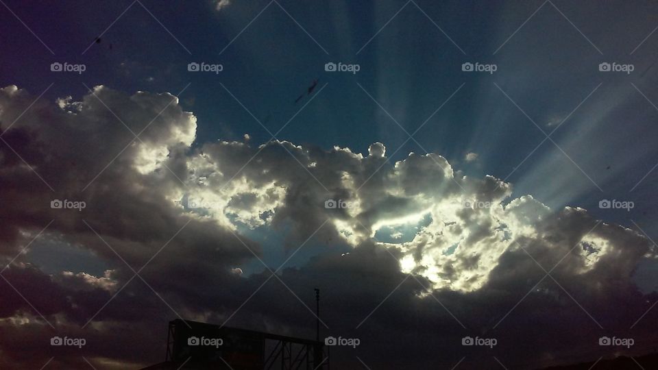 Explosion of Sun Through the Clouds