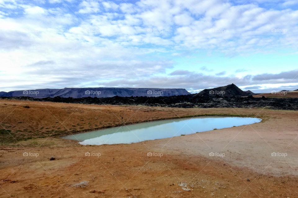 Turquoise volcanic pond