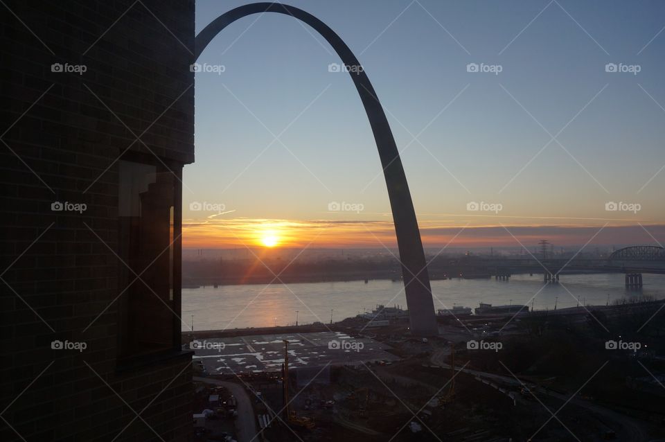 Sunrise through the St Louis Arch.  View from my hotel room.