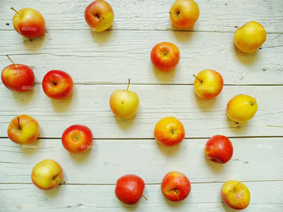 High angle view of apples on wood