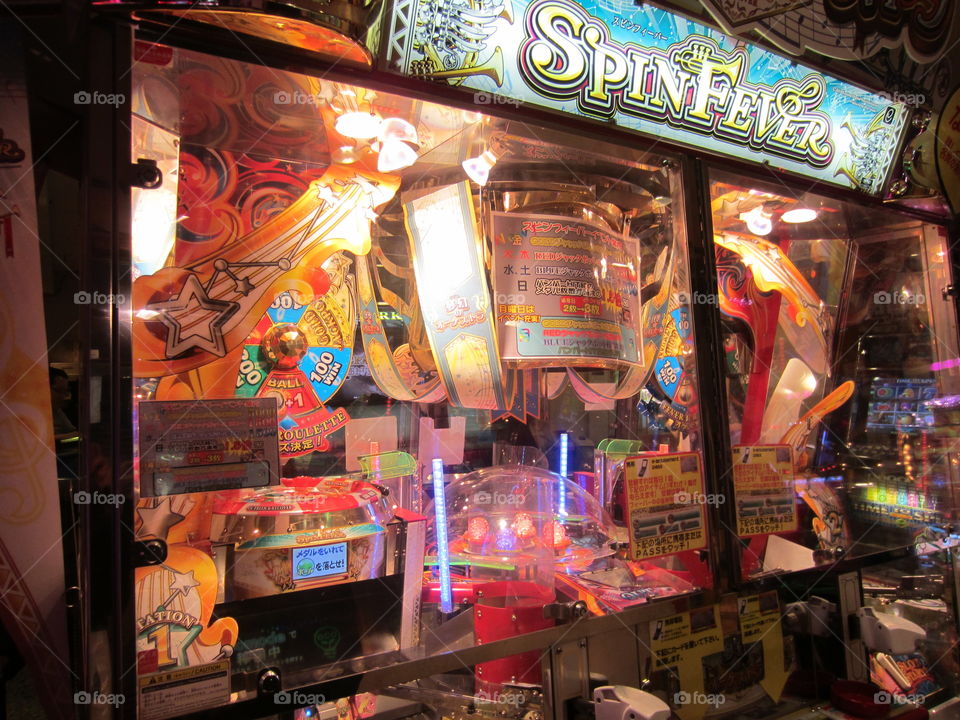Closeup of Arcade Games, Tokyo, Japan.  Lights and Machine Details