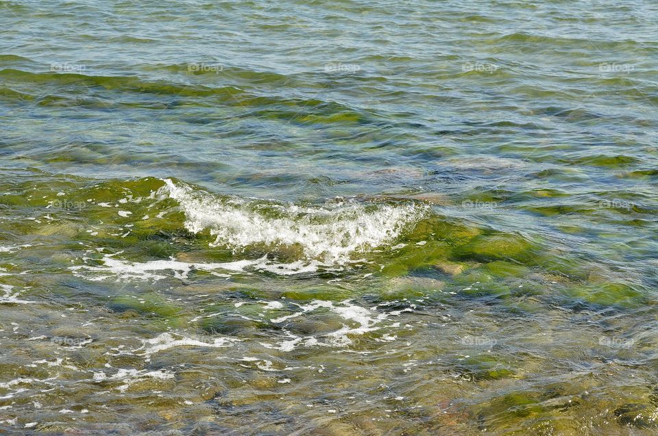 transparent waves on the Baltic sea in Poland