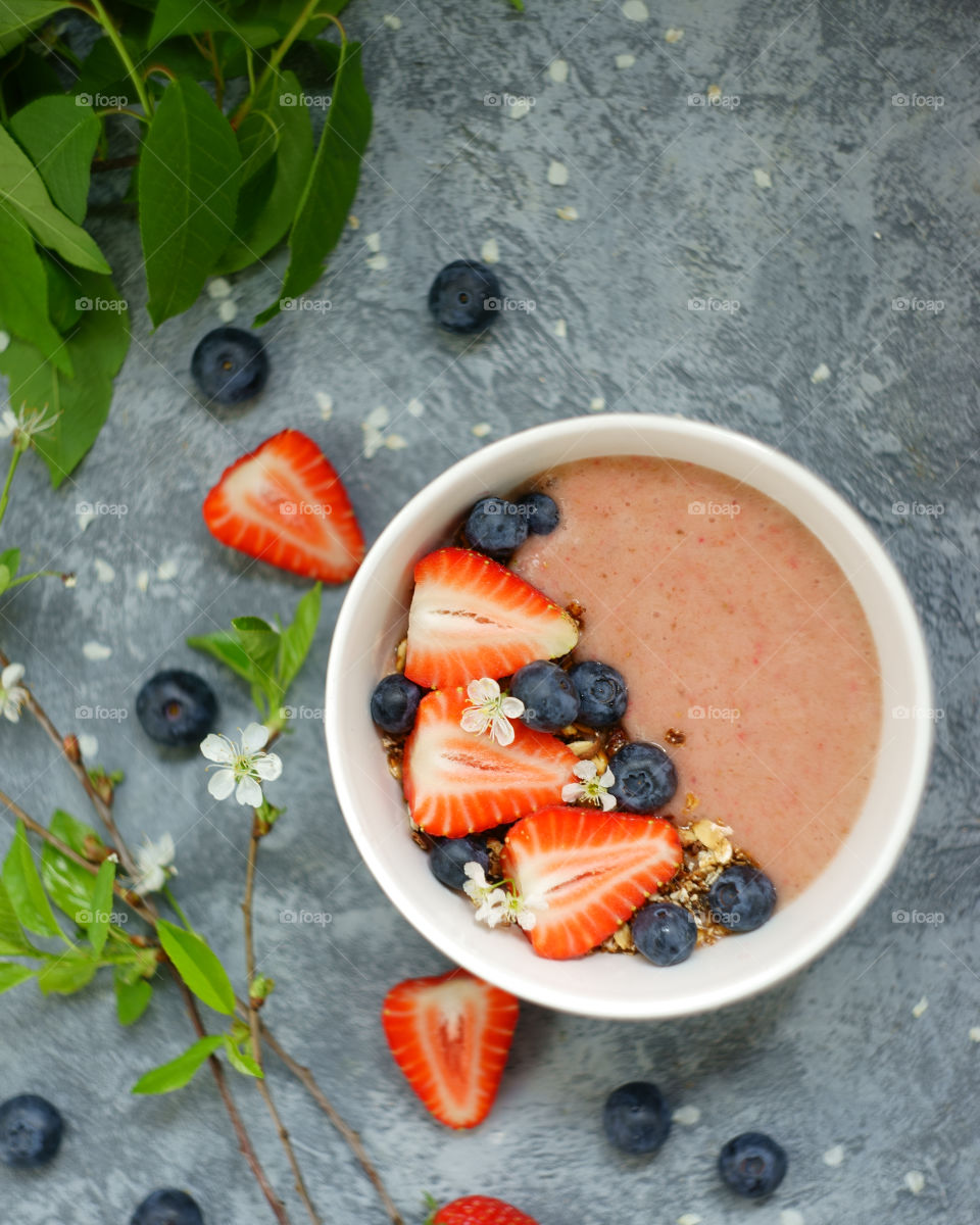 High angle view of smoothie and fruits in bowl