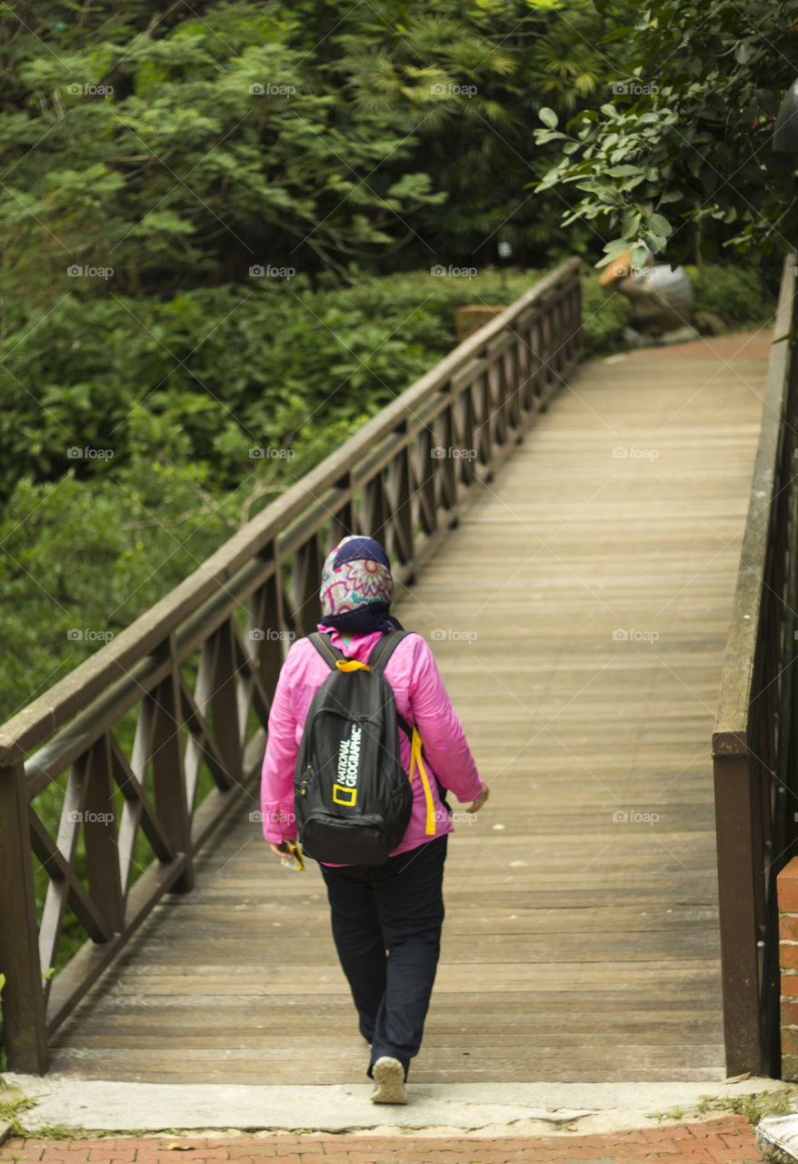 A Muslim Tourist with Hijab in Birds Park, Kuala Lumpur, Malaysia