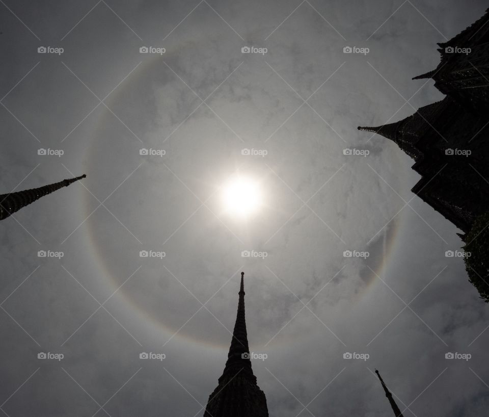 Natural miracle , Halo sun over Thai temple attract tourists attention to excite