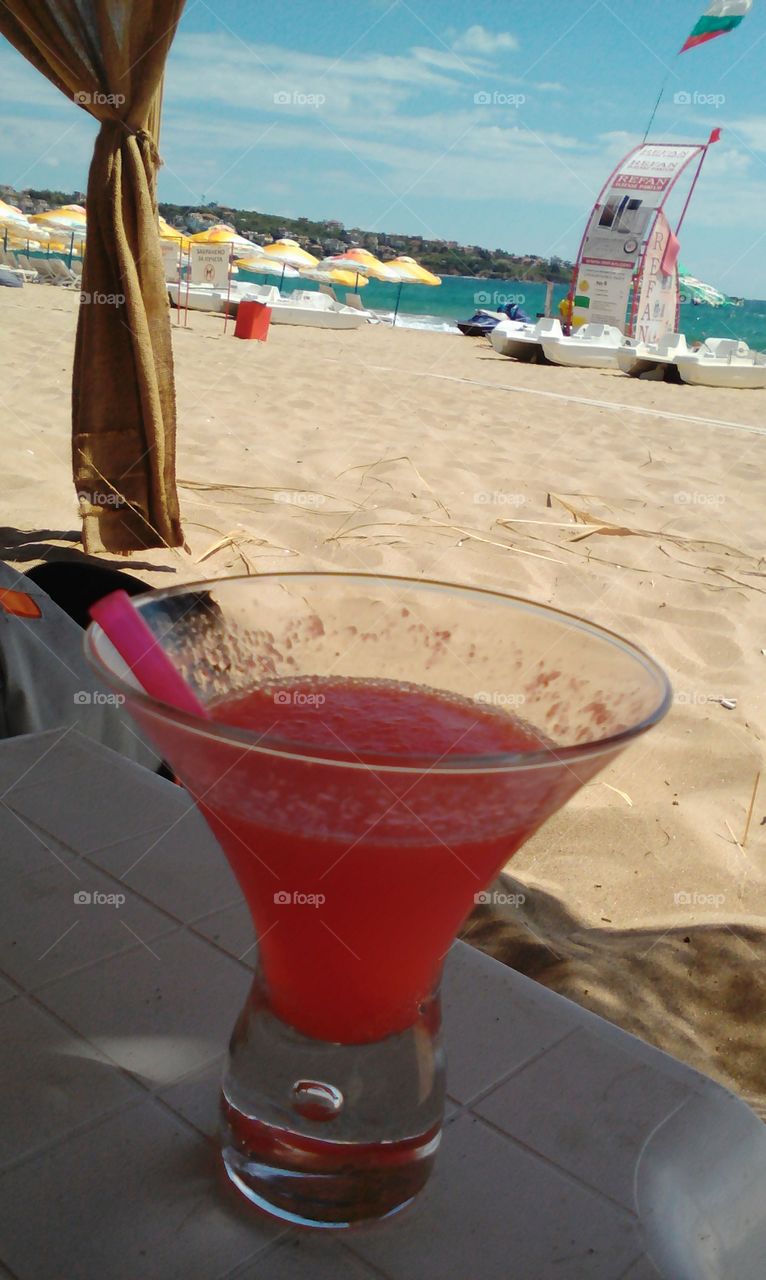 Drinking on the beach