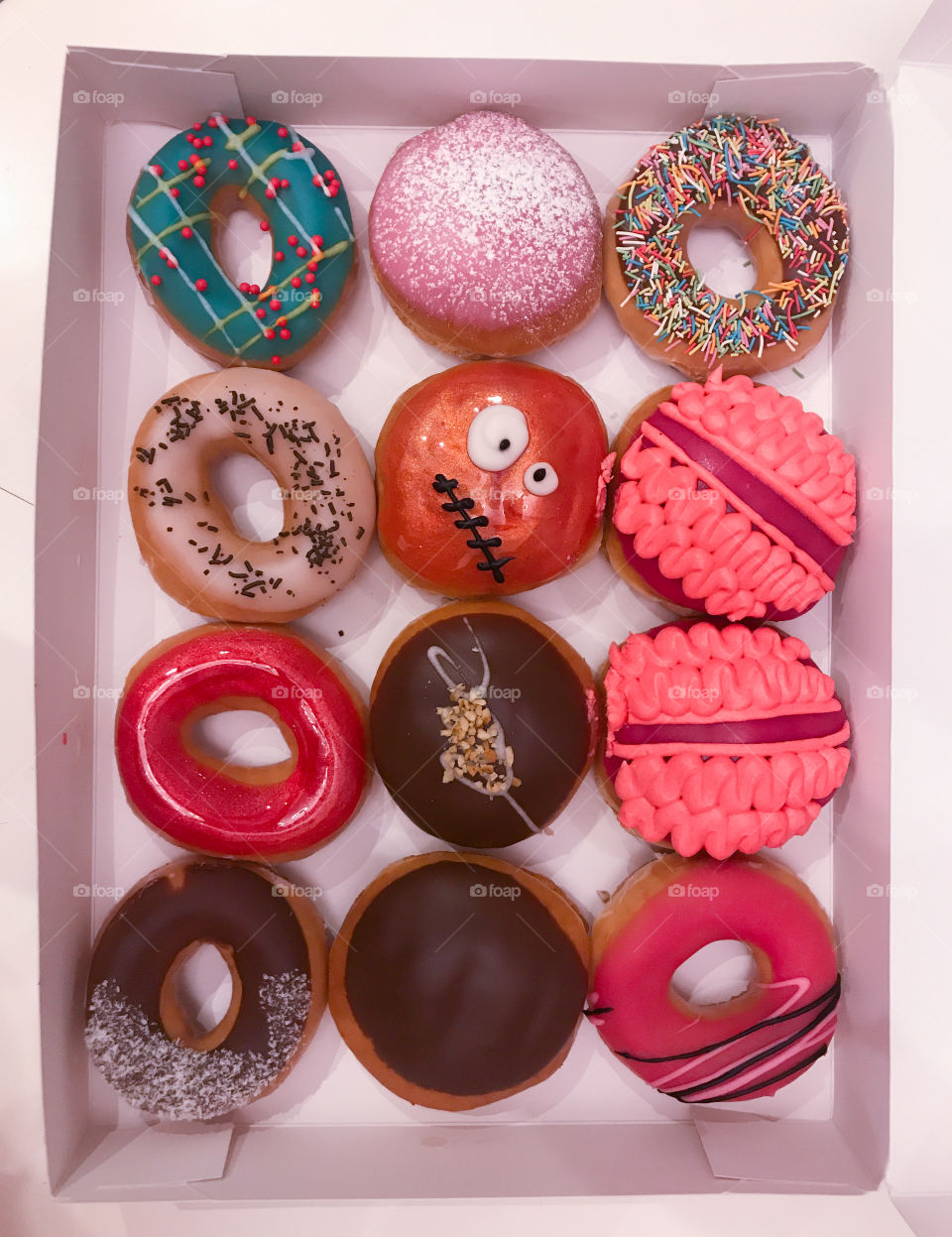 Colourful Doughnuts in a box 