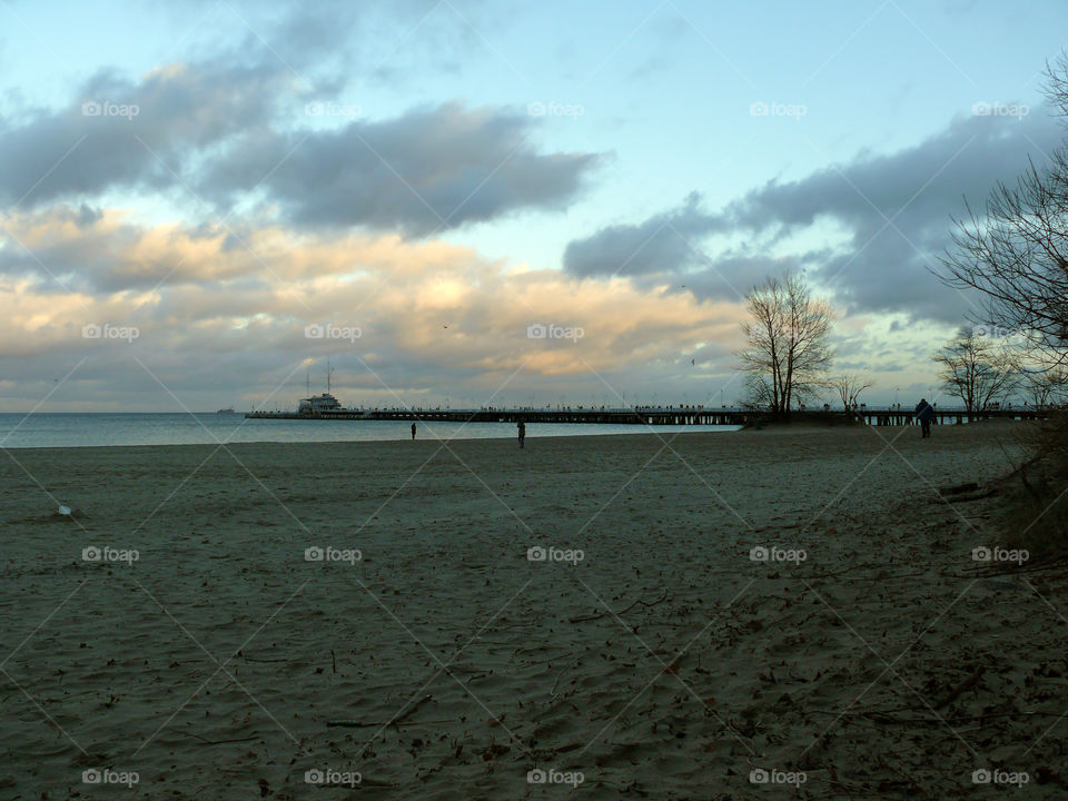 Silhouette of pier over sea in Sopot, Poland.