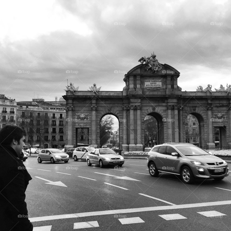 Puerta de Alcalá . Rainy day walk through Madrid 