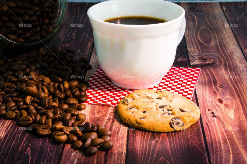 coffee been still life on wooden background