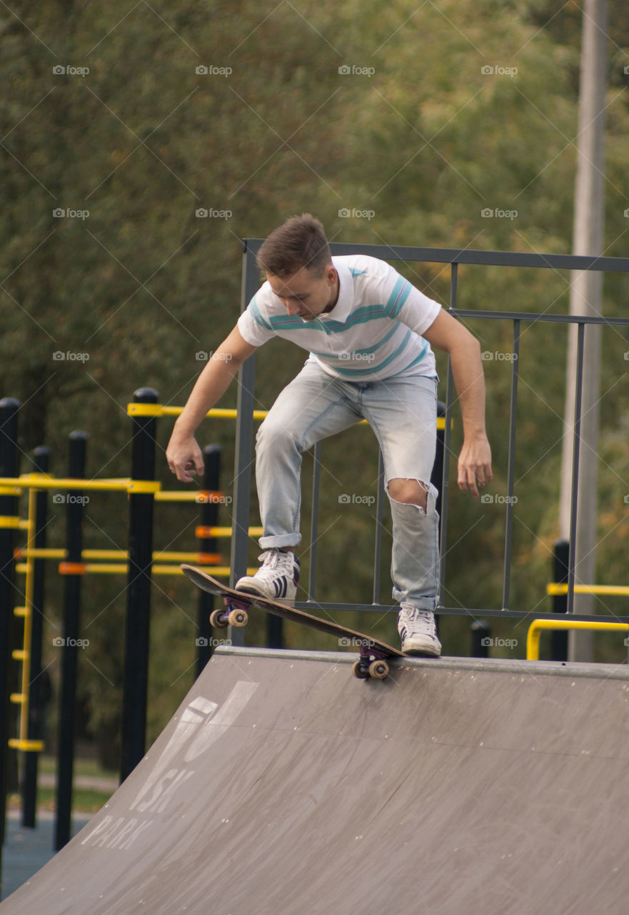 man rides a skateboard. skateboarder