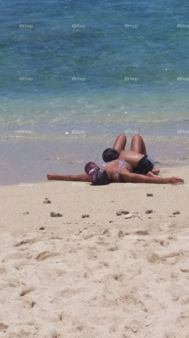 Hanging on the Beach. Mom and Son