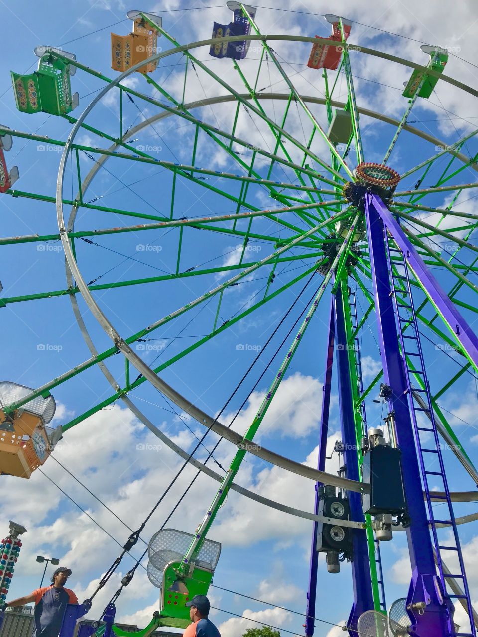 Ferris Wheel against a beautiful blue sky 