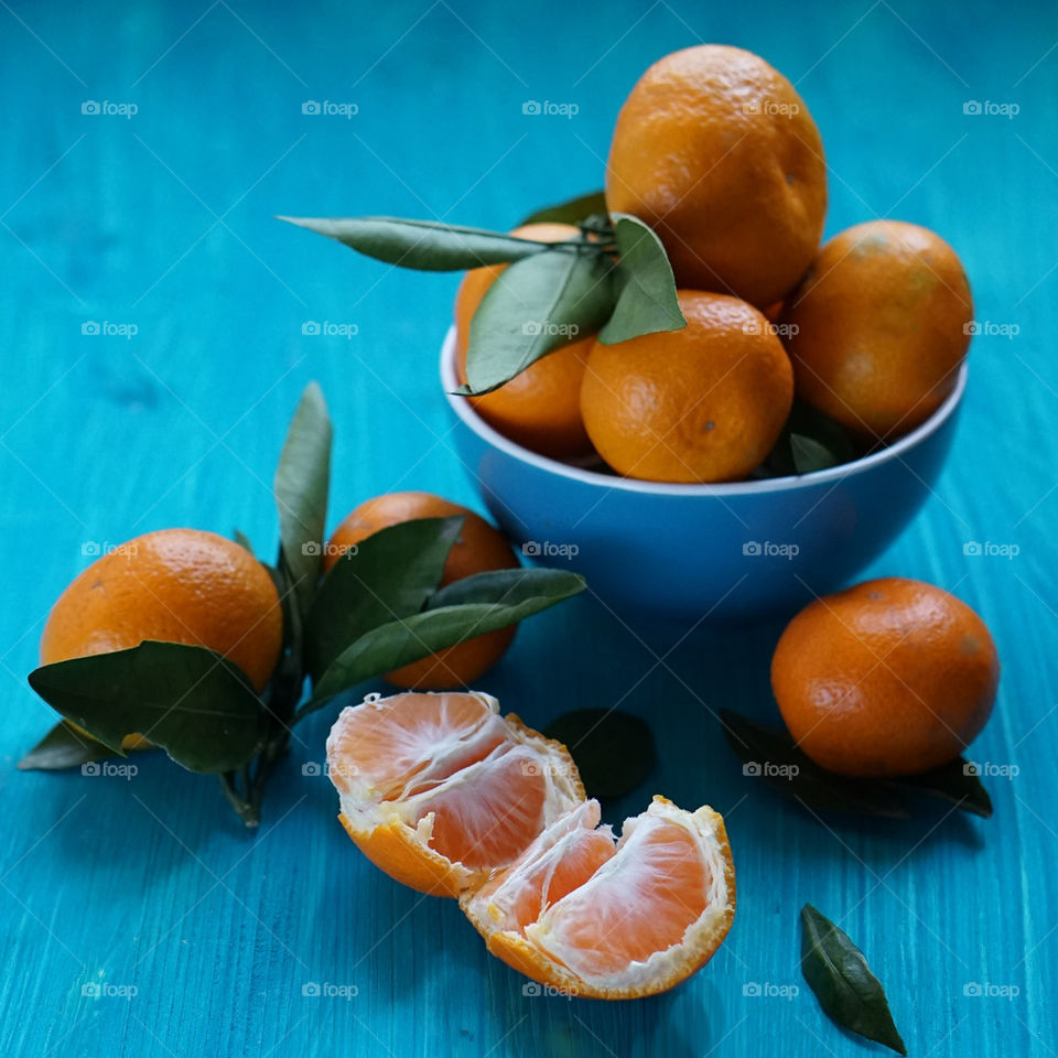 Tangerines on wooden table