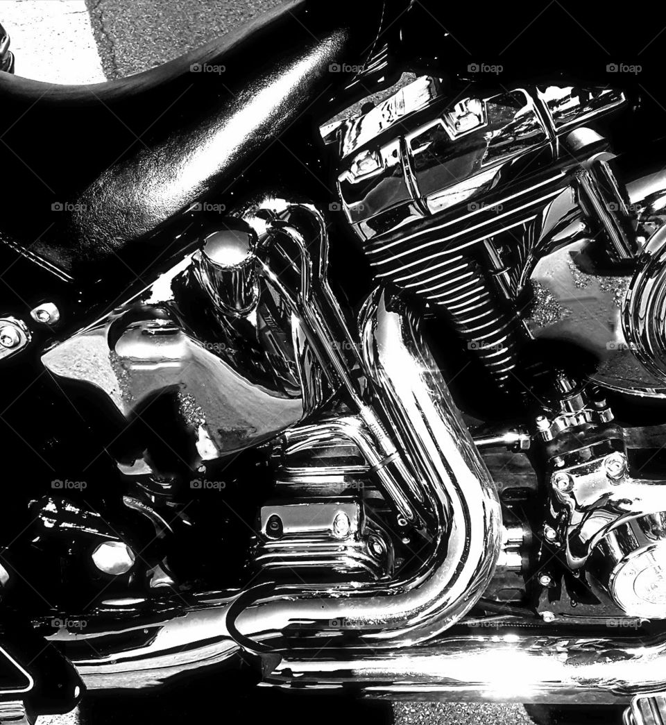 Side view of a Harley. lots of chrome.