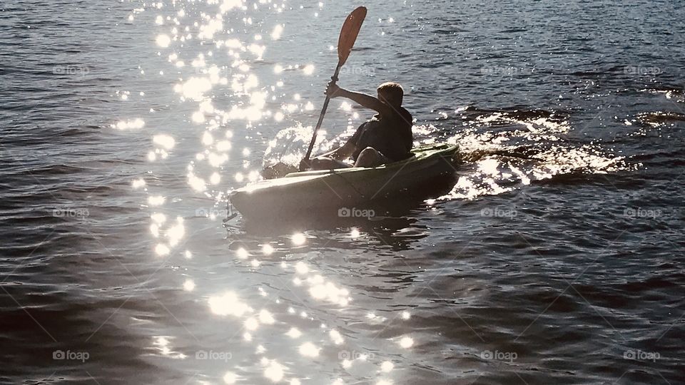 Gorgeous early morning kayak adventure for this young man turns out to be a great way to get some exercise! 