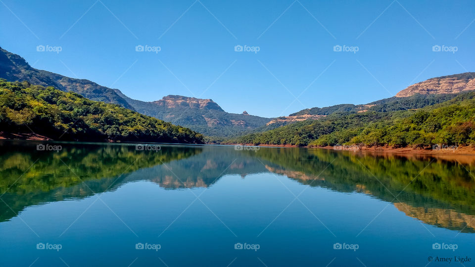 Blue sky reflected in lake