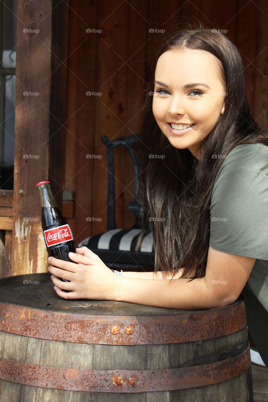 Holding a Bottle of Coke