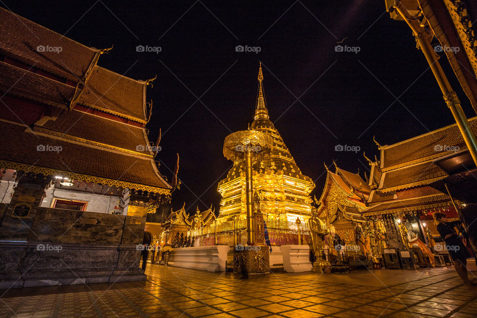 Wat Phrathat Doi Suthep pagoda at night in Chiang Mai Thailand 