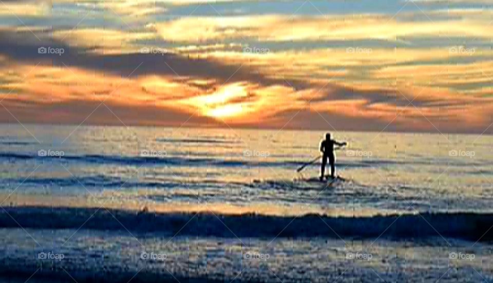 Social distancing paddle boarding