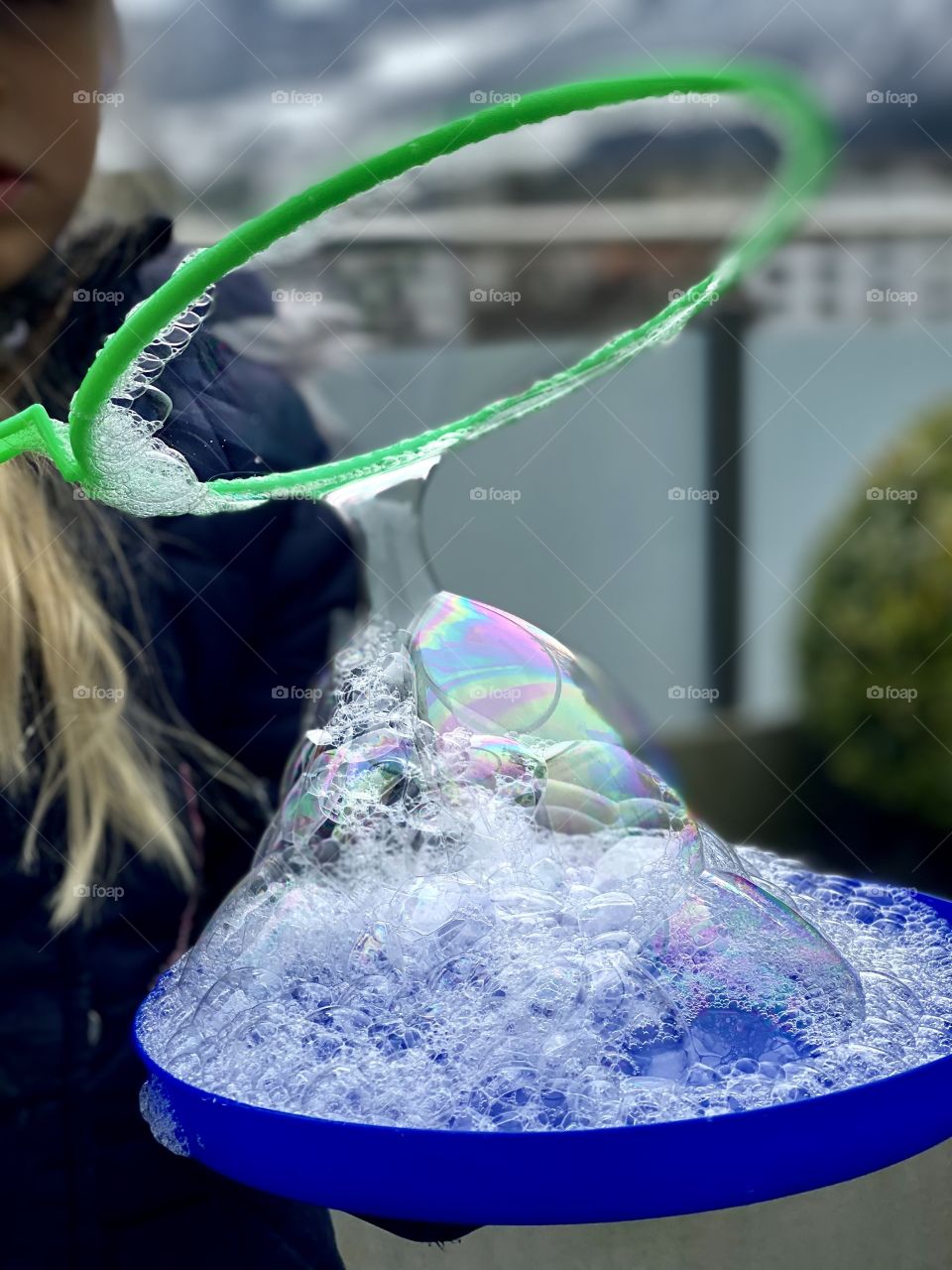 soap bubbles, the girl blows big soap bubbles