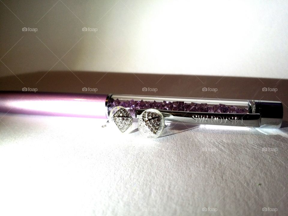 Pen and earrings