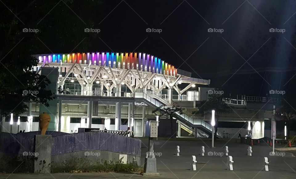 Love Pier Station.It is currently the only elevated station in the Kaohsiung light rail system. night shot . rainbow light