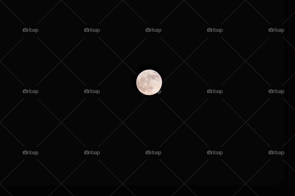 Full moon on black background 
