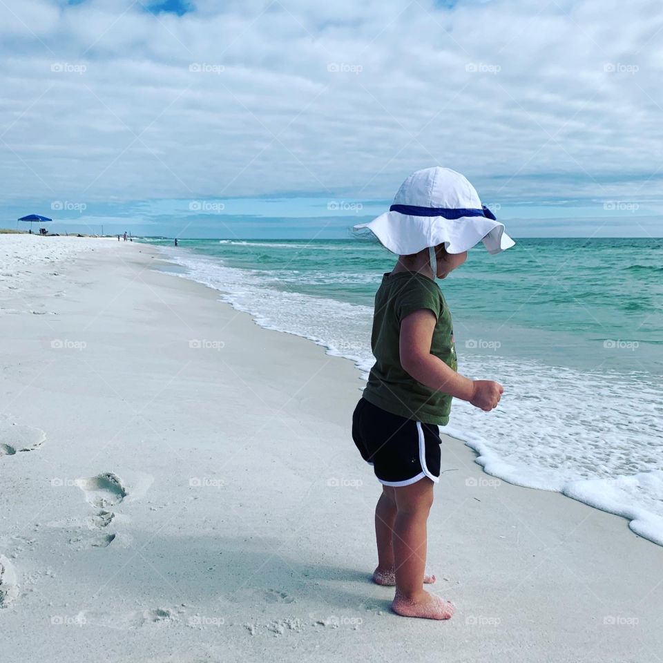 Girl standing on Beasley Park Beach Gulf of Mexico Emerald Coast