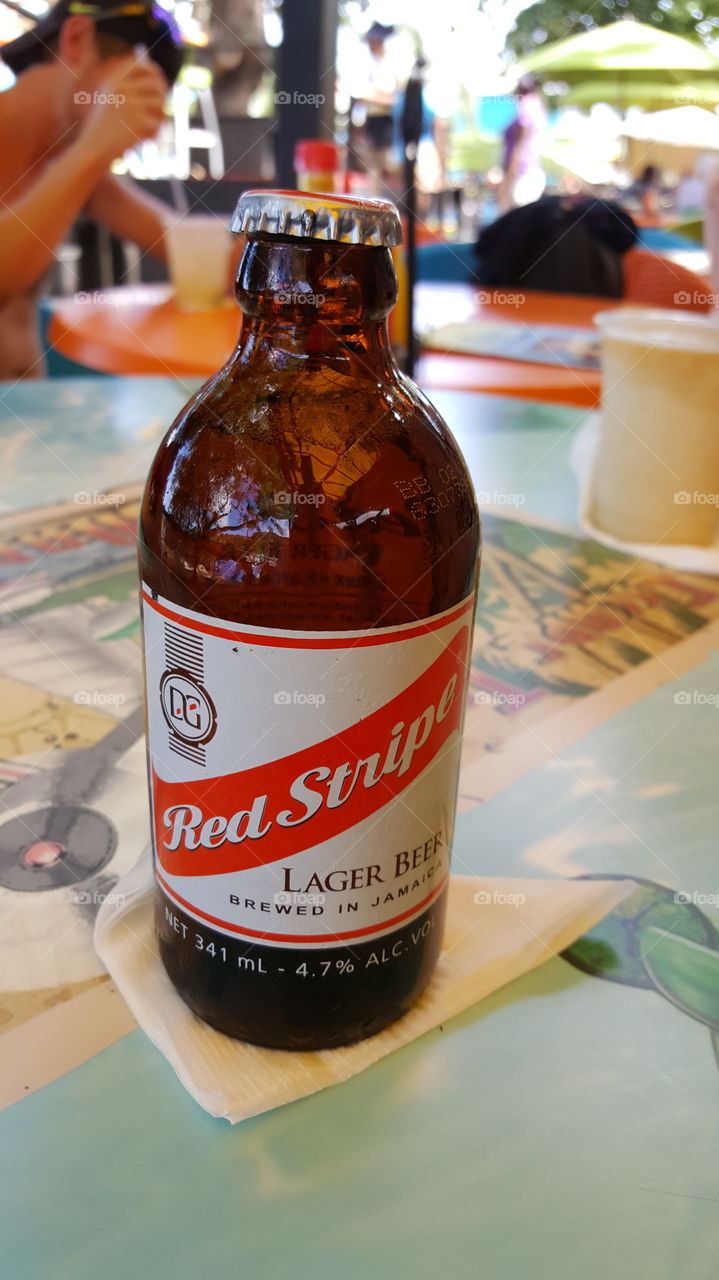 Margaritaville in Ocho Rios Jamaica drinking Red Stripe