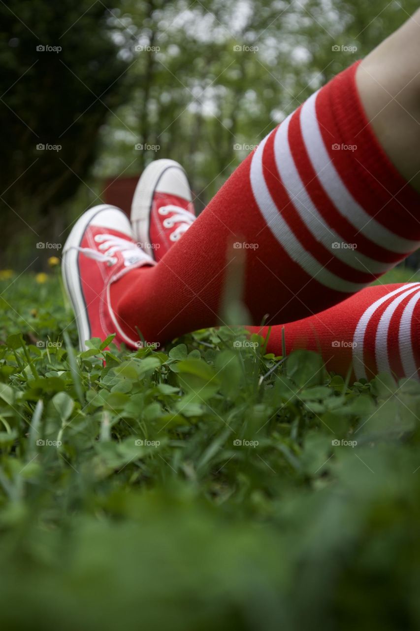 Red and Green; Long Socks and Shoes while sitting in the grass