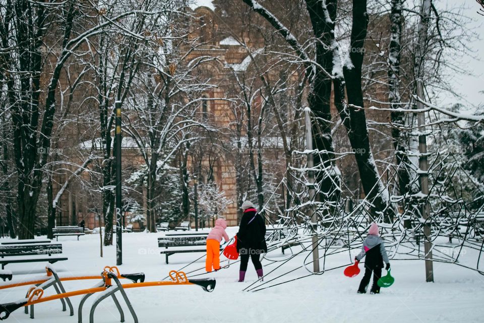 sledding on the first snow - Children playground