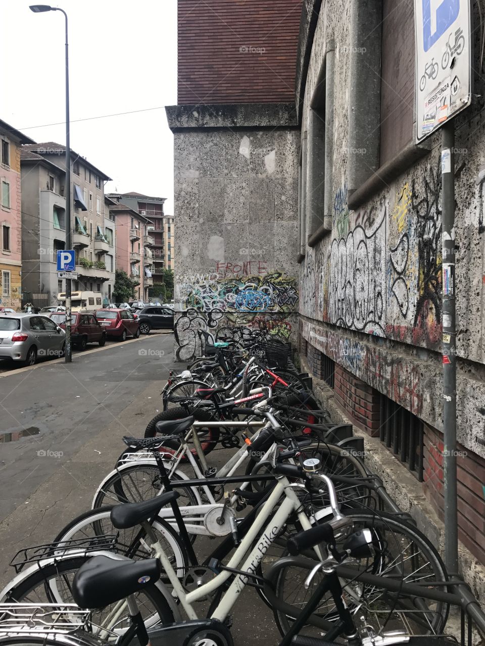 bicycle parking area in front of the school in milano
