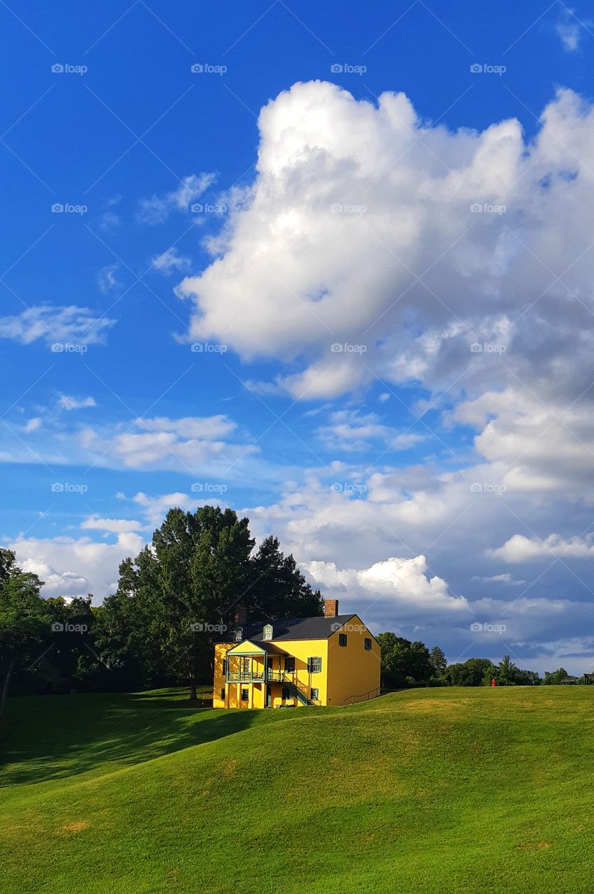 A house on the hill! just like in fairy tales. this was such a crazy amazing sight and a beautiful capture with all that crazy cloudy sky.