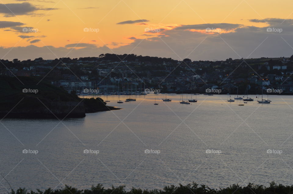 sunset reflected in a bay