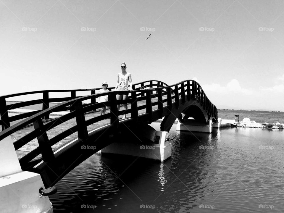 Mother and daughter o the bridge