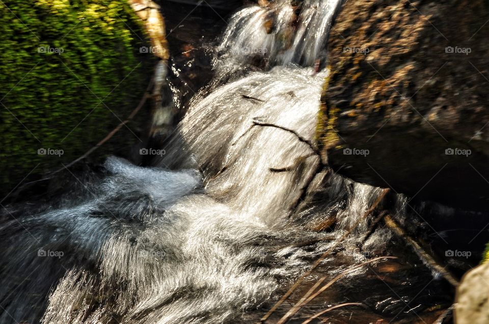 waterfall in the spring park in Poland