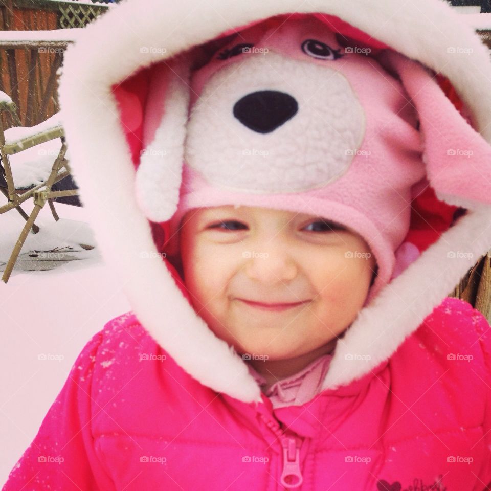 Snow princess. Toddler in the snow