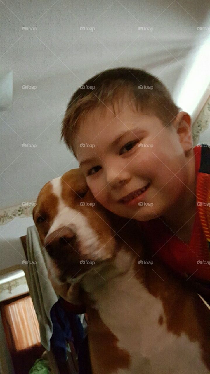 a boy and a dog